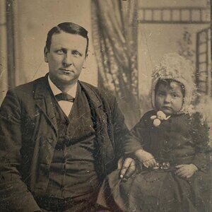1800s Ferro Tintype Light Eyed Man in Suit with Baby Girl Studio Portrait